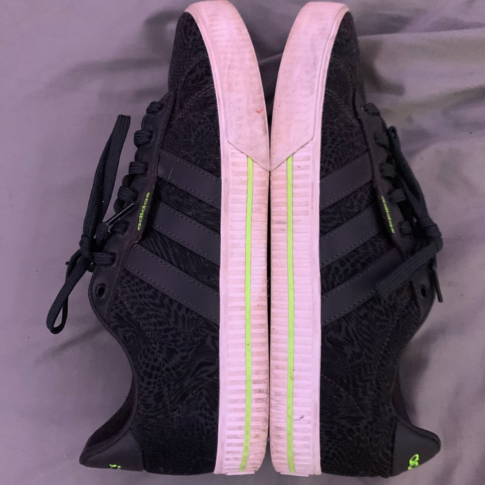 green, white, black adidas.